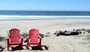 Red chairs on beach